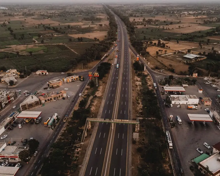 Highway and green fields in Punjab, Pakistan